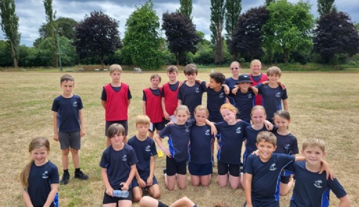 Photograph of the children who represented the district at the Area Athletics Championship.