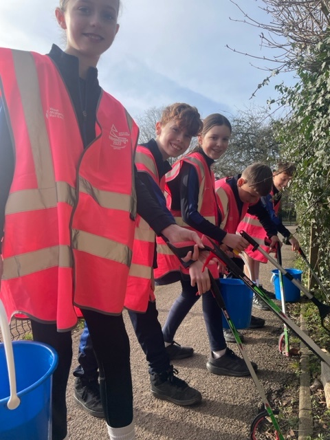 Picture showing our school counsellors involved in local litter pick.