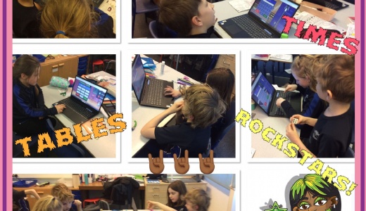 Y3 pupils using laptop devices in the classroom to access Times Tables Rockstars.