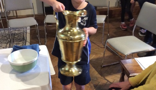 Year 3 pupil learning about Church artefacts.